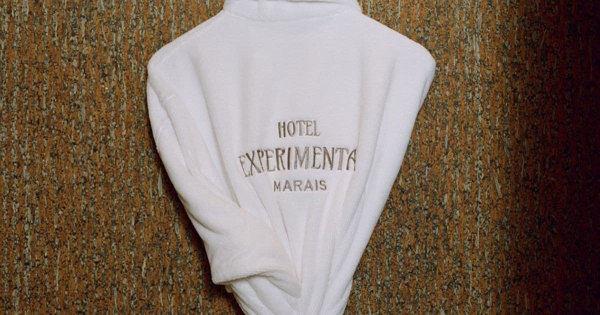 Experimental Marais guest room with moody design details